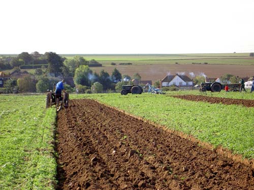 Ploughing on field by Acol Hill